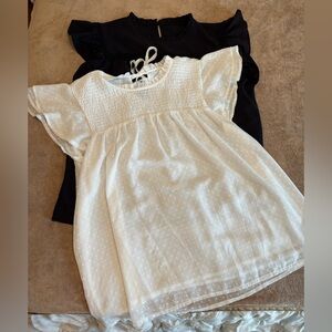 TWO blouses in excellent condition black & white size 2XL